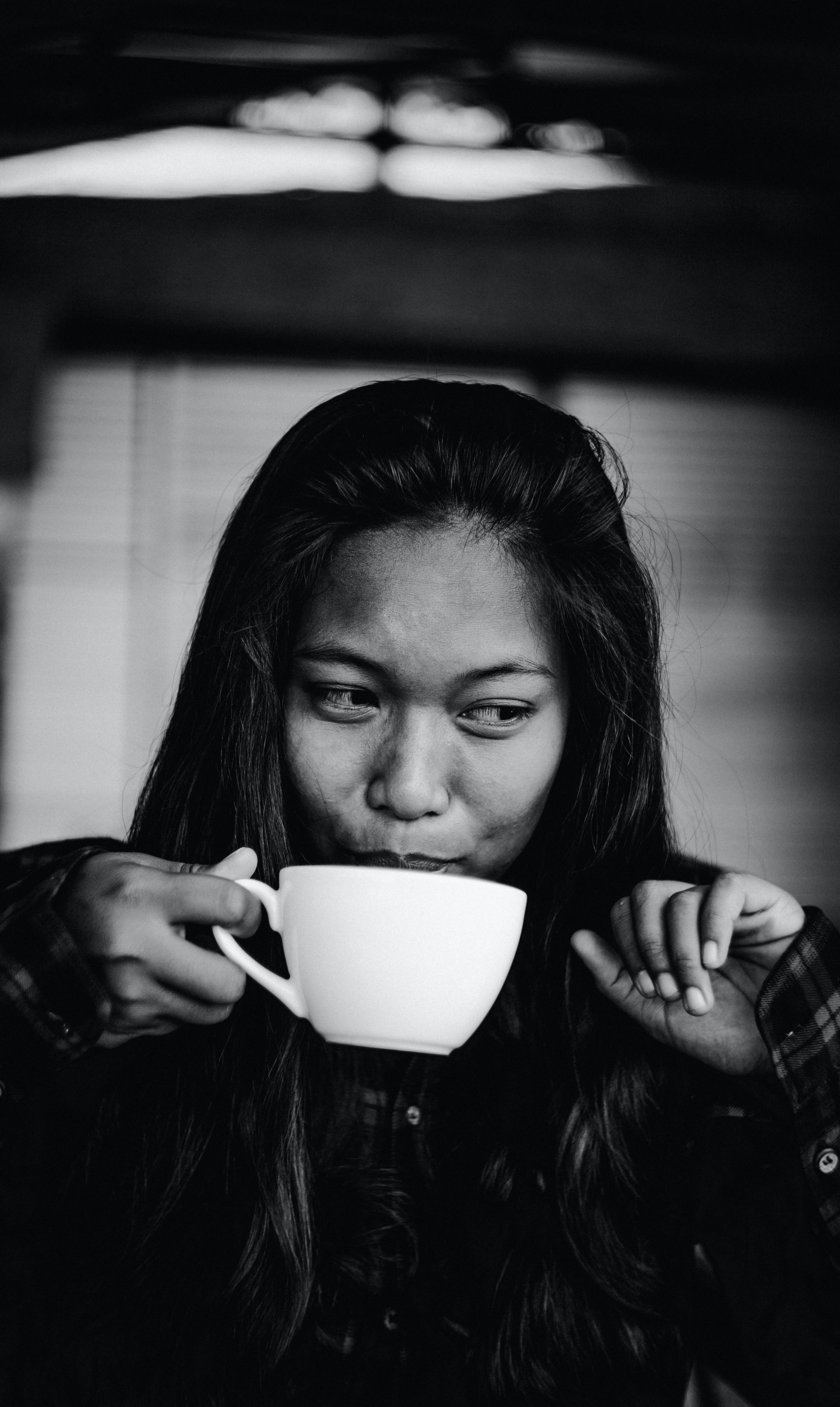 person drinking coffee